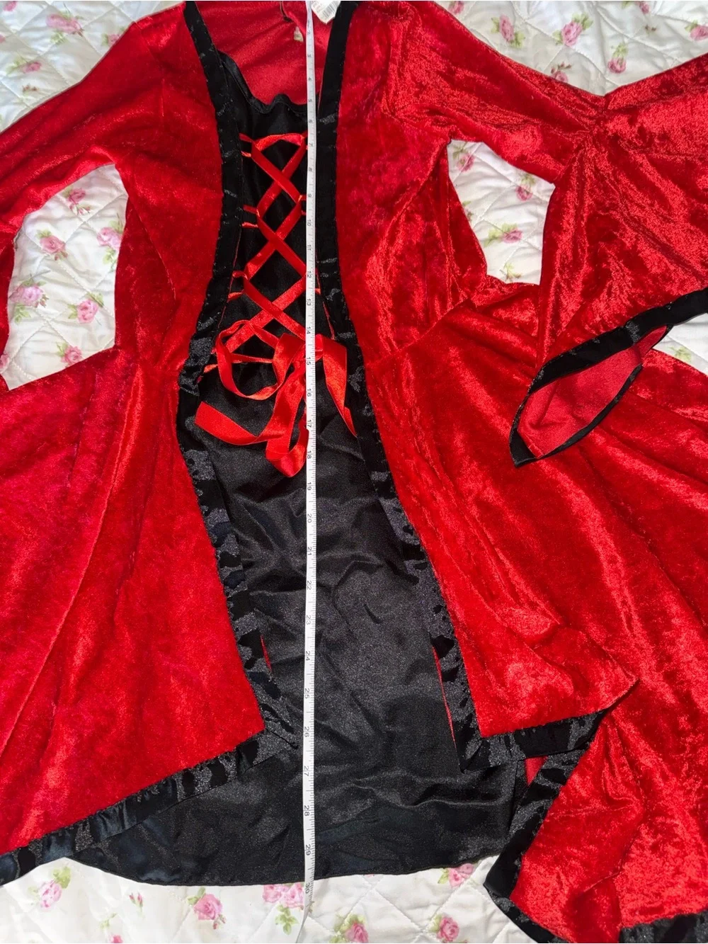 Red velvet dress with black trim and lace-up front, size L